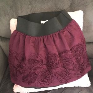 Skirt and black floral shirt